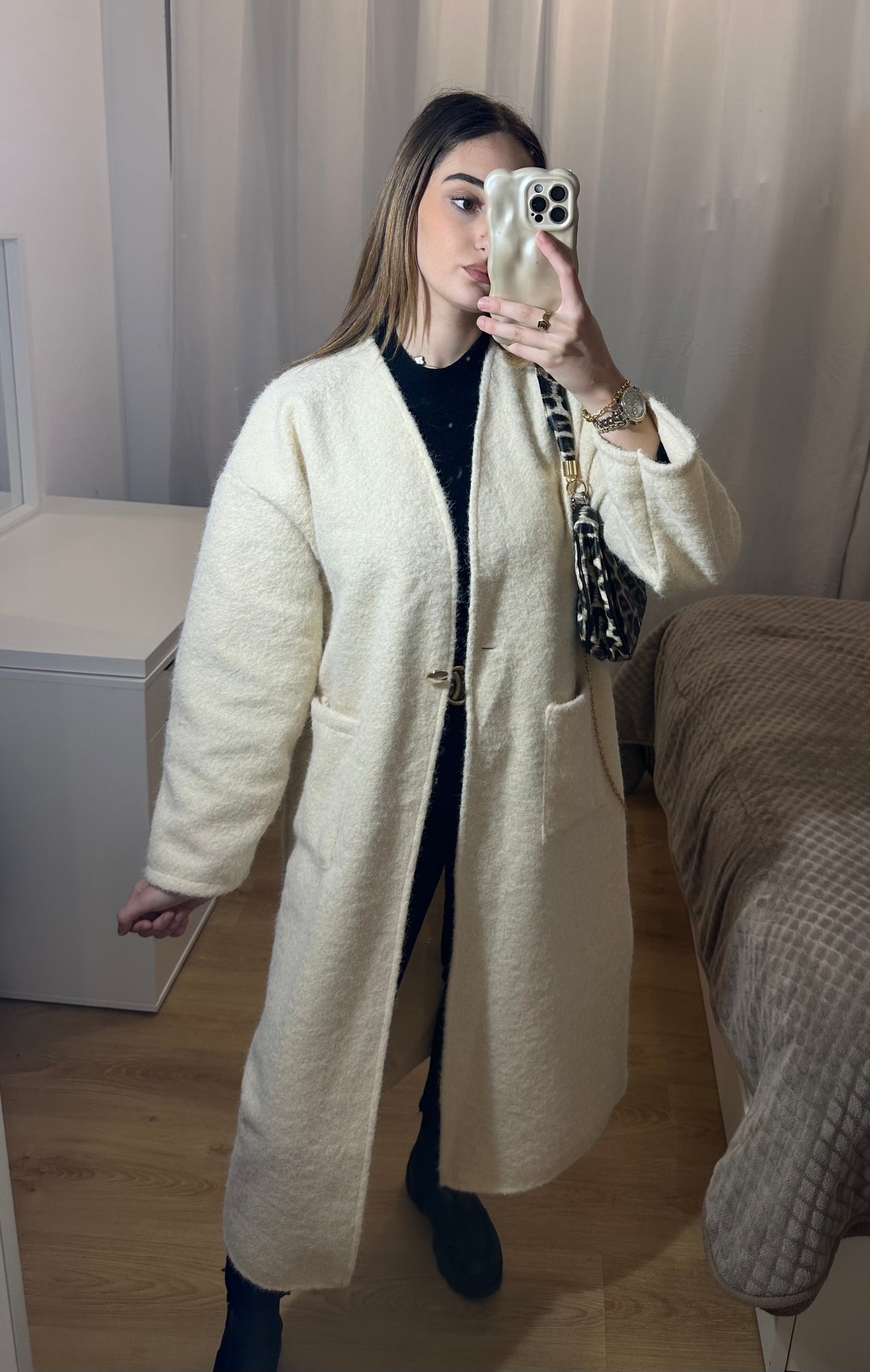Veste longue effet bouclée