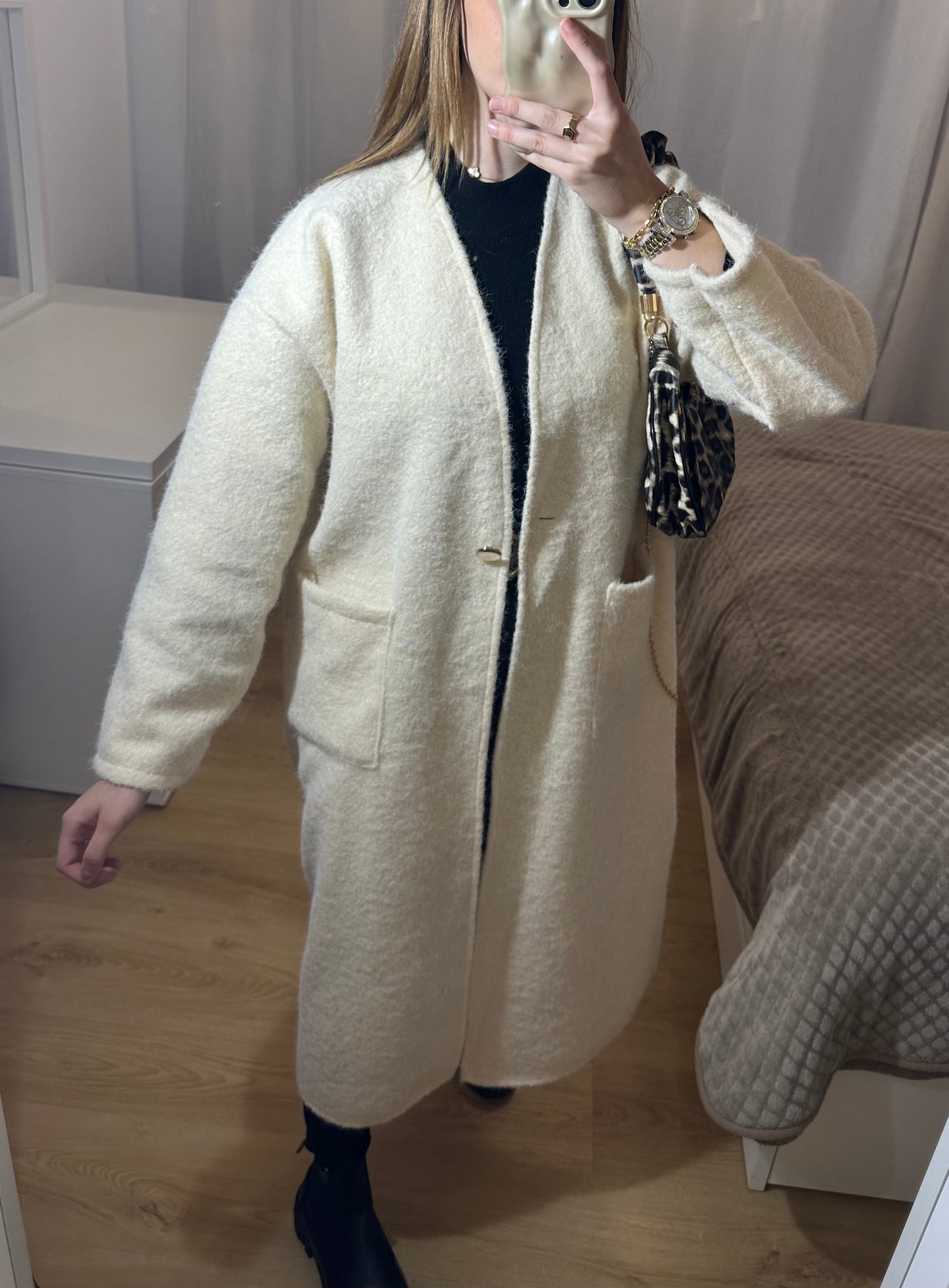 Veste longue effet bouclée